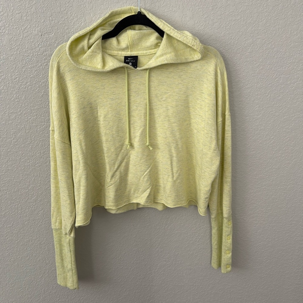 Women’s Nike gray yellow dri-fit crop hooded top. Button sleeves. Size medium.